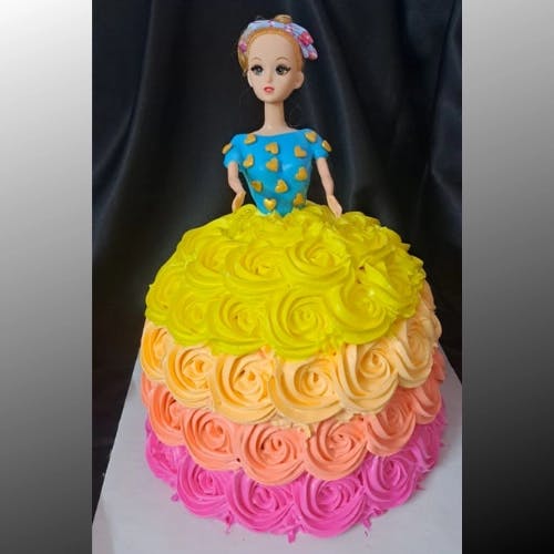 Barbie Doll Cake Embark on a magical journey of sweetness and elegance with our Barbie Doll Cake, a masterpiece of beauty and grace that will make you feel like a true princess.