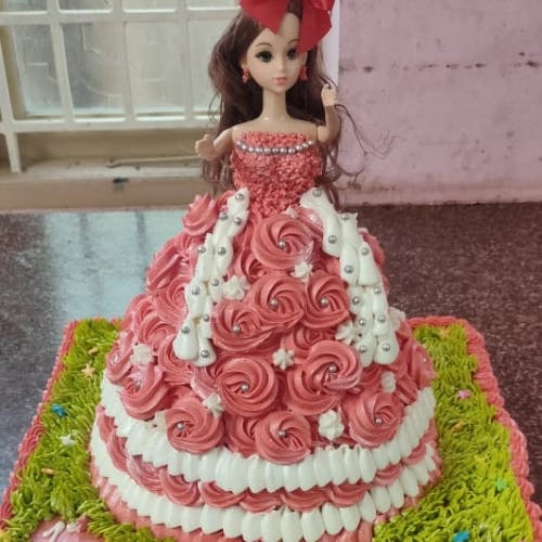 Brown Barbie Cake Make your little girl's day with our delicious Brown Barbie Cake. Perfect for birthdays and special occasions.