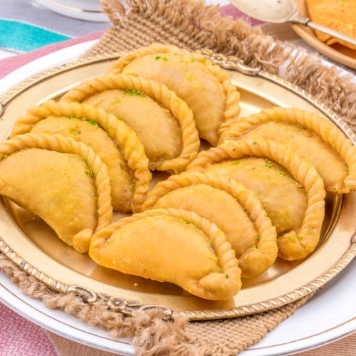 Chandrakala Experience the divine flavors of Chandrakala Sweet from Grace Bakery