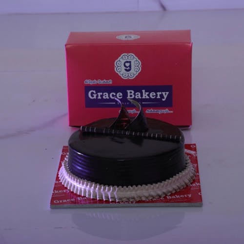 Choco Truffle Cake Let the richness of Choco Truffle Cake take you on a journey of pure indulgence, as smooth chocolate ganache envelops layers of moist chocolate cake. Experience true delight at Grace Bakery