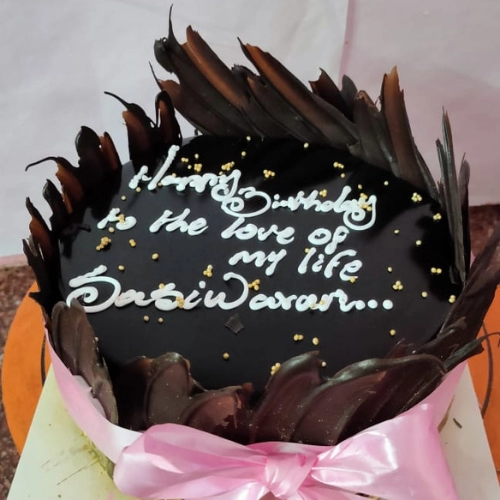 Dark Choco Truffle Cake Satisfy your cravings with the velvety richness of Dark Choco Truffle Cake, where layers of moist chocolate cake are cloaked in a luxurious dark chocolate ganache. Immerse yourself in pure indulgence at Grace Bakery