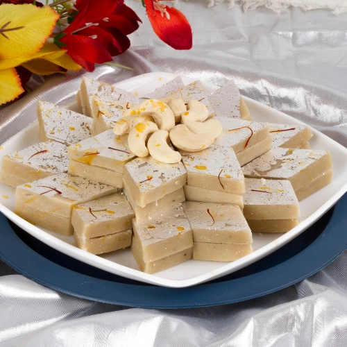 Kaju Katli Indulge in the authenticity of Kaju Katli, a beloved Indian sweet made with cashews.