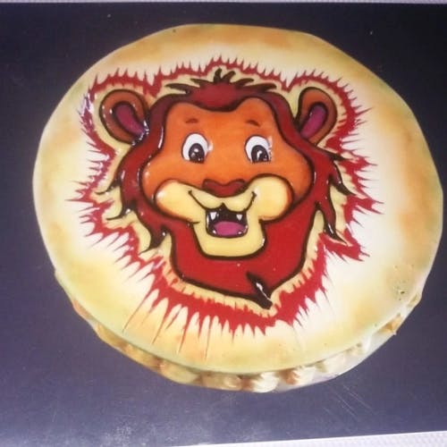 Lion Cake Our Lion Cake is the perfect addition to any celebration. Impress your guests with this show-stopping cake!