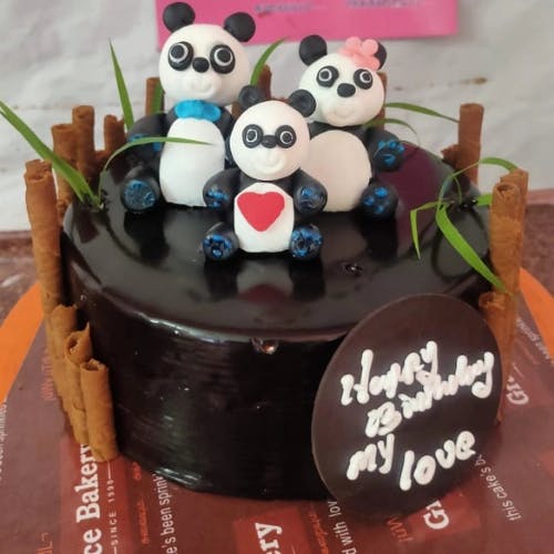 Panda Choco Truffle Cake Let the cuteness overload of Panda Choco Truffle Cake steal your heart, as the velvety richness of chocolate truffle meets the irresistible charm of panda-shaped cake. Delight in every bite of this adorable creation at Grace Bakery