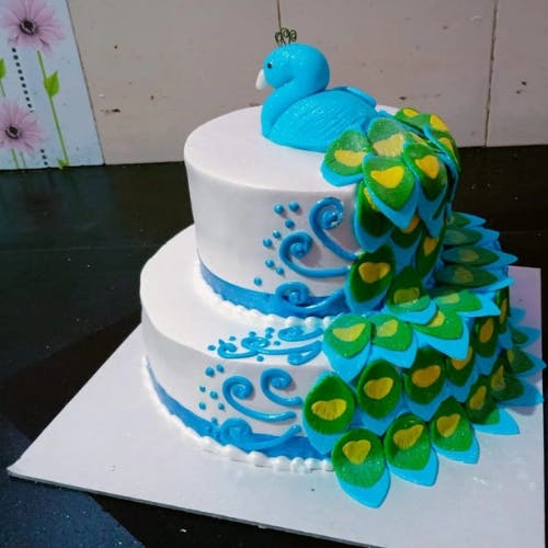 Peacock Wedding Cake Impress your guests with our beautiful and delicious cake