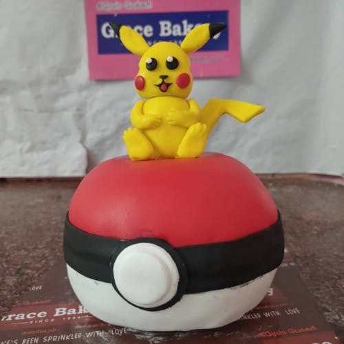 Pokemon Fondant Cake Journey through the sweet and magical world of Pokemon with our fondant cake. The vibrant colors and intricate details of your favorite Pokemon characters are handcrafted with love and care, creating a masterpiece that's almost too beautiful to eat. As you take your first bite, you'll feel a burst of joy and excitement, just like when you caught your first Pokemon. Every layer of moist cake, decadent frosting, and sweet fondant is a new adventure, filled with surprises and delights. Whether you're celebrating a birthday, graduation, or just the joy of being alive, our Pokemon Fondant Cake is the perfect way to capture the spirit of fun and adventure. So grab your fork, and get ready to "Gotta Eat 'Em All!"