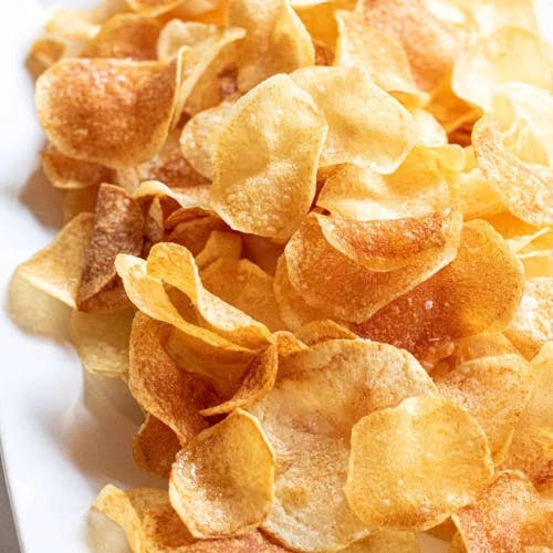 Potato Chips Experience the ultimate snacking pleasure with crispy potato chips.