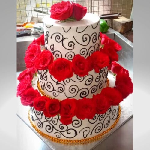 Rose Flower Wedding Cake Impress your guests with our stunning and delicious floral masterpiece