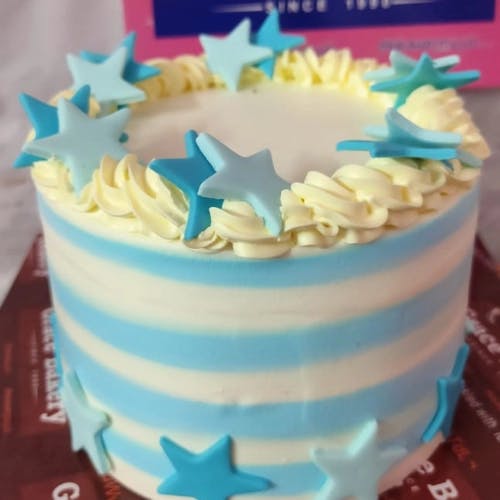 Star Birthday Cake Let the magic of Star Birthday Cake illuminate your special day! With its mesmerizing star-shaped design and a heavenly combination of fluffy vanilla sponge and silky-smooth buttercream, this cake is sure to take you on a celestial journey of taste and texture. Order now at Grace Bakery and shine like a star!
