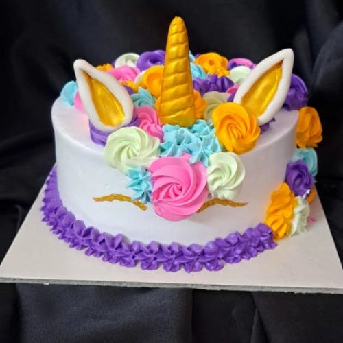 Unicorn Birthday cake Make your little one's birthday extra special with an Unicorn Birthday Cake. This magical cake is expertly decorated with pastel colors, shimmering details, and a glittering horn, making it the perfect centerpiece for any unicorn-themed party. Whether you're celebrating a first birthday or a sweet 16, an Unicorn Birthday Cake is sure to make your celebration even more special. With its delicious flavor and whimsical design, this cake is a crowd-pleaser that's sure to leave a lasting impression. Made with only the finest ingredients and expertly baked, this cake is a true work of art. So treat your little one to a magical delight with an Unicorn Birthday Cake that's sure to make their day even more memorable.