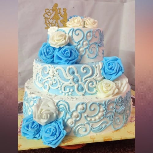 White Rose Wedding Cake Celebrate your big day with a stunning and delicious cake